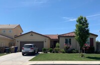 Building Photo - SW-Bakersfield features 4 bed 2 bath with ...