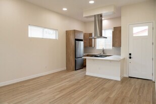 View of kitchen and front door - 4772 Bancroft St