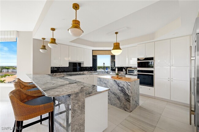 Building Photo - 7575 Pelican Bay Blvd