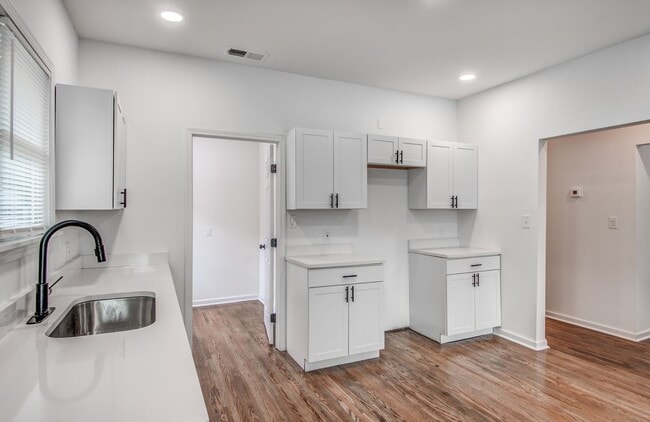 Building Photo - Live Stylishly. Live Comfortably. Live Mem...