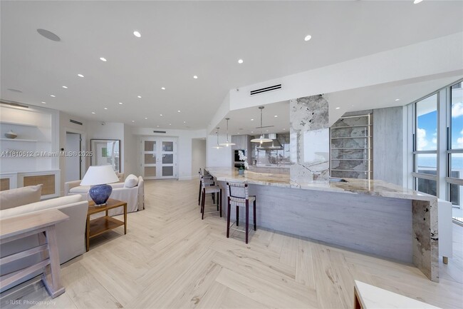 Building Photo - 10225 Collins Ave