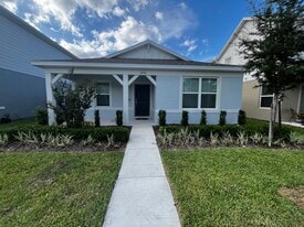 Front entrance and covered porch. - 3438 Orange Rose Loop