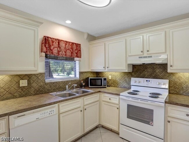 Building Photo - 4912 Tamiami Trl E