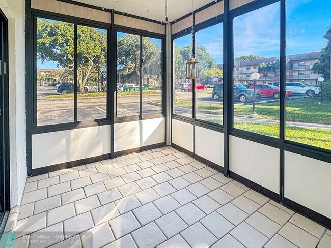 Building Photo - 6090 N Sabal Palm Blvd