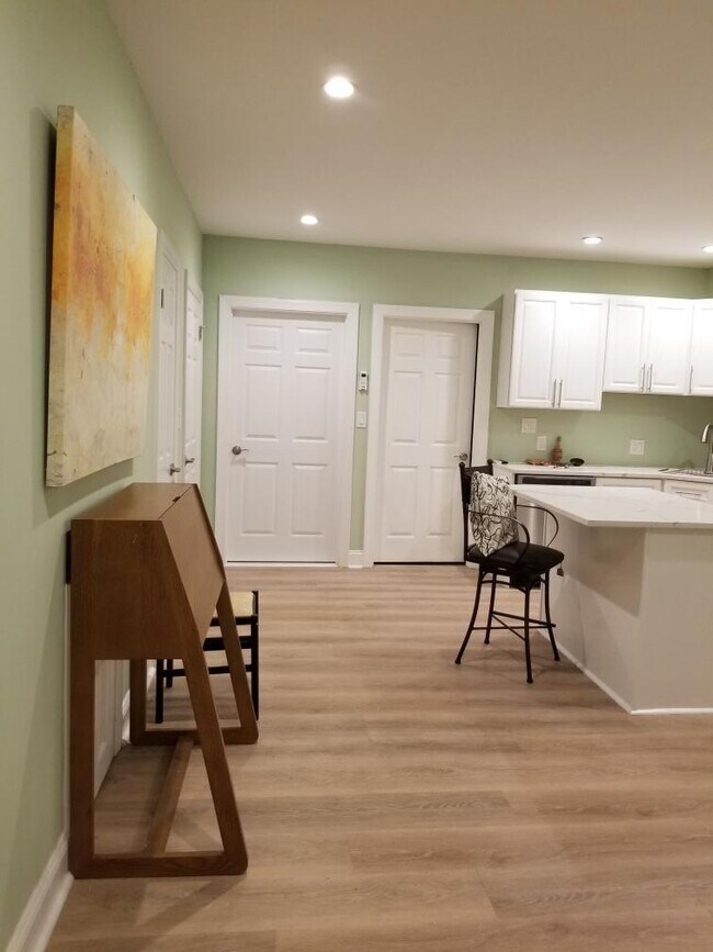 Main room looking toward master bedroom - door on right, on left is 2nd bathroom. - 1632 5th St NW