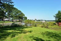 Building Photo - STUNNING 3 BEDROOM RANCH WATERFRONT HOME O...