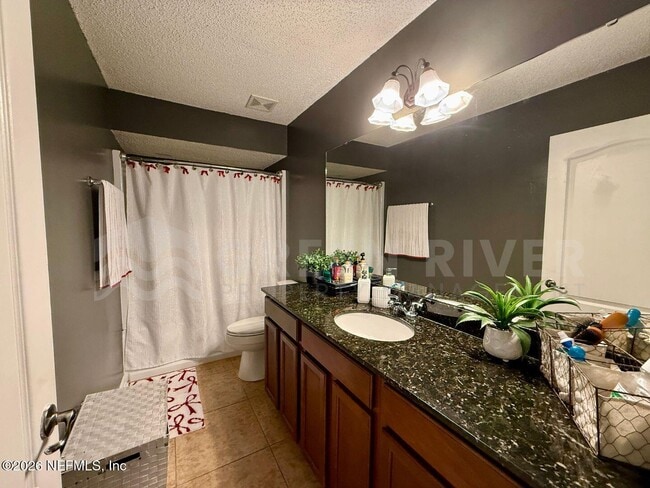 Building Photo - 7541 Allspice Cir N