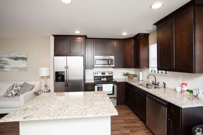 Building Photo - Serrano Townhomes with a finished basement...