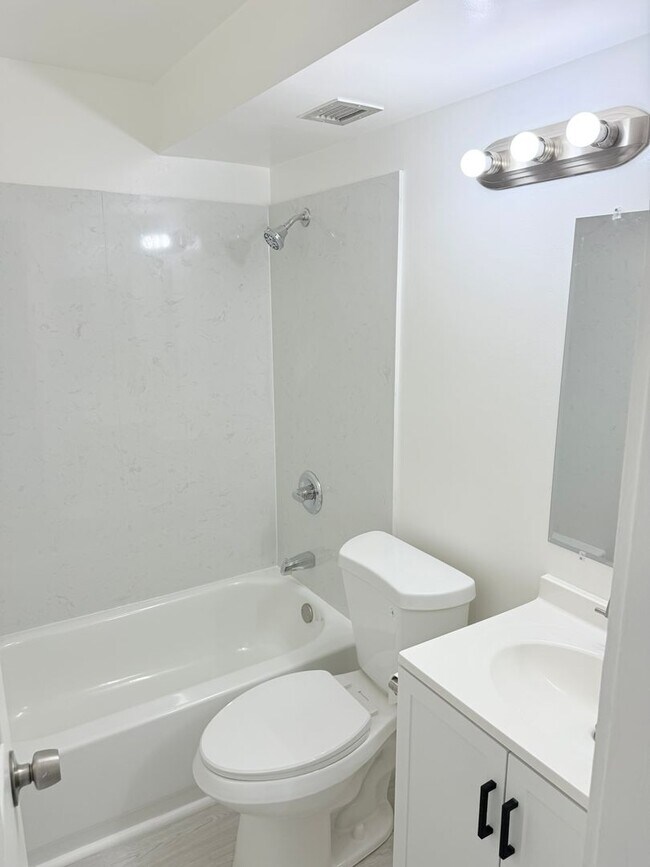 Building Photo - Sunset Lakeview - Fully renovated 3 bedroom, 2 bath with One open parking