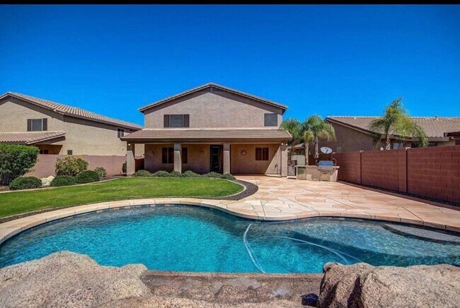 Building Photo - Stunning 4BR House in Phoenix with sparkling pool, resort style backyard and solar panles