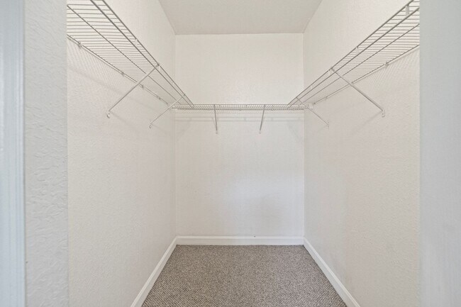 Building Photo - 2-bath condo on the 2nd floor with a newly...