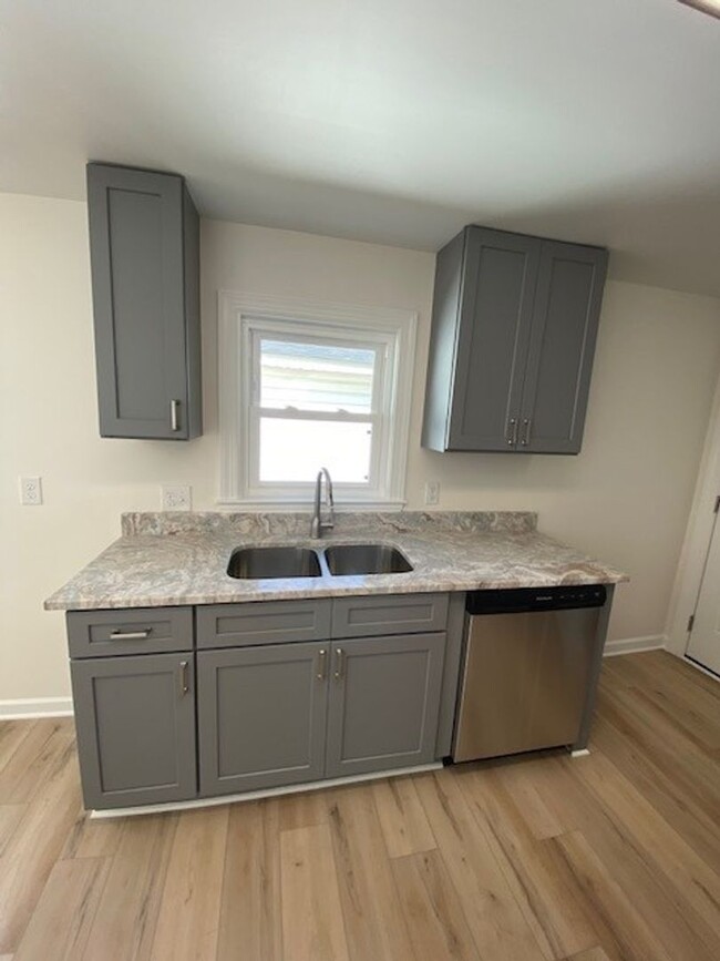 Building Photo - Welcome to this newly remodeled 4-bedroom,...