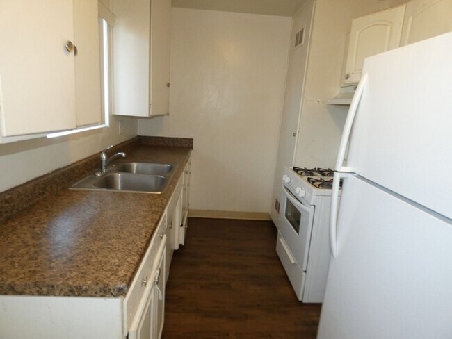Building Photo - Light and Bright Upstairs One Bedroom Apar...