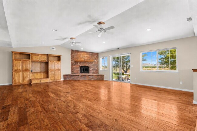 Building Photo - Private Gated Mini-Ranch • 7+ Acres • Luxury Country Living • Indoor Pool • Horses Welcome