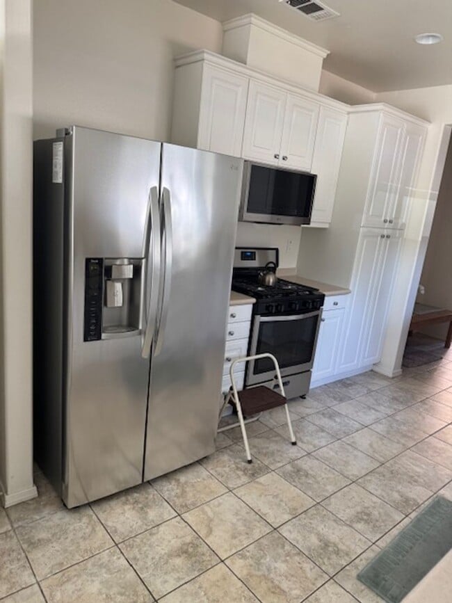 Building Photo - 9137 Arbol del Rosal Way