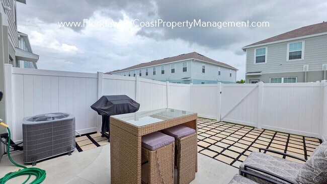 Building Photo - OUTSTANDING TOWNHOME IN LAKEWOOD RANCH! 3 ...