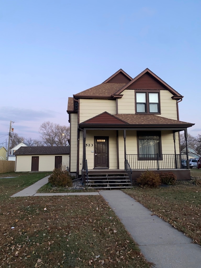 Front entrance with garage in back - 523 21st St N
