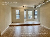 Building Photo - Darling Downtown Racine 2 Bedroom LOFT