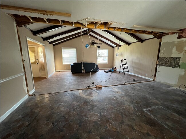 Wall between the kitchen and living room removed - 120 Lake Point Dr