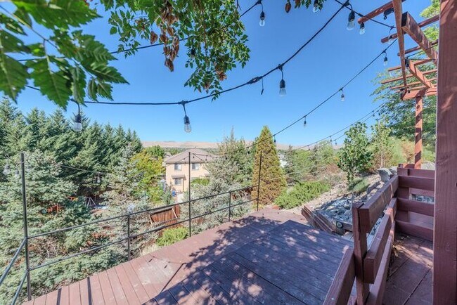 Building Photo - Welcome to this STUNNING 4-bedroom, 2.5-ba...