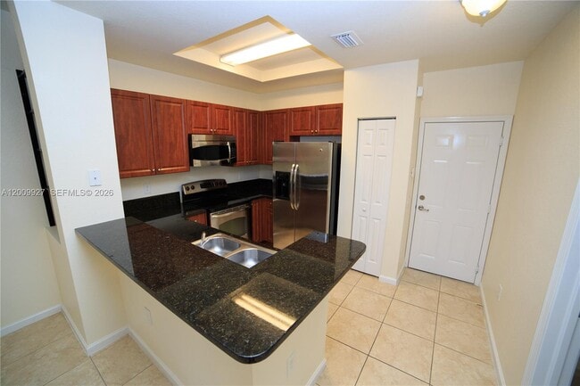 Building Photo - 4501 Mimosa Terrace