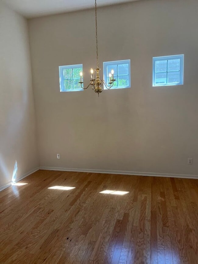 Building Photo - Available now. Great 4BR/3BA Home in Carol...