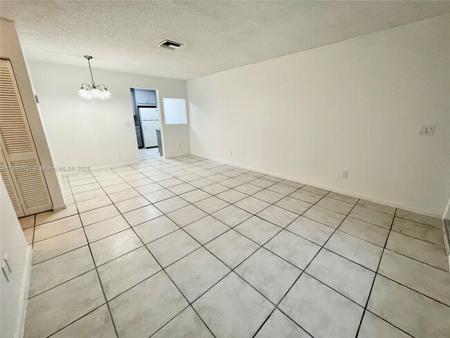 Building Photo - 10992 Royal Palm Blvd