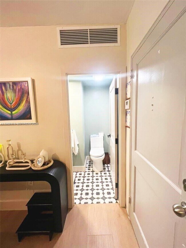 Building Photo - 10185 Collins Ave