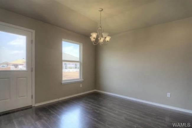 Building Photo - Stylish 4BR/2BA Home with Garage & Privacy Fence