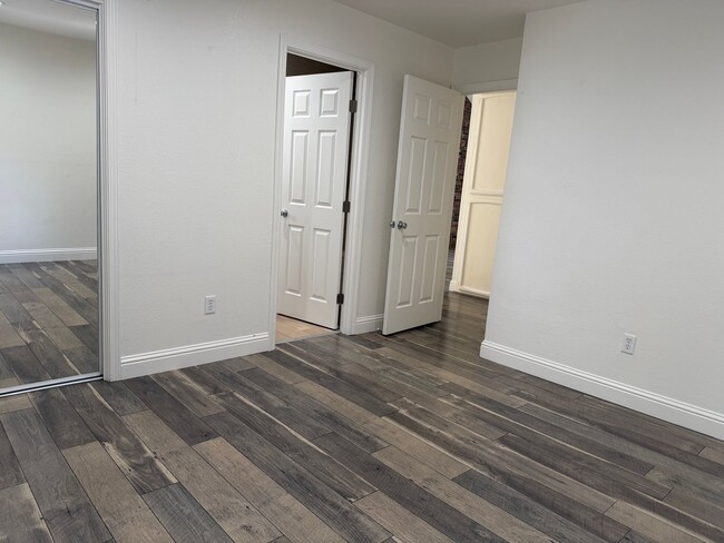 Building Photo - Gorgeous 2 bedroom 2 bath duplex in the trees