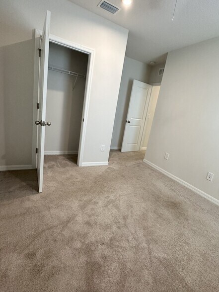 Bedroom 2 closet - 10782 Old Sycamore Loop