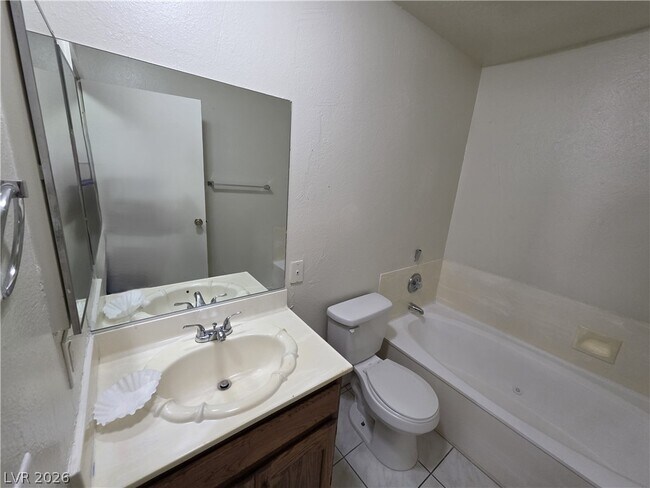 Building Photo - 6671 W Tropicana Ave