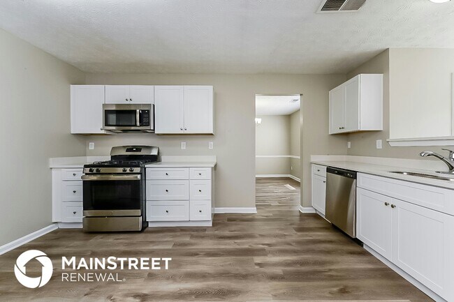 Building Photo - 5587 Orchard Rd