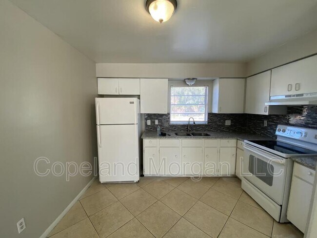 Building Photo - 5615 E 127th Ave