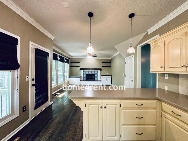 Building Photo - Blue Valley Schools w/ Wood Floors, Finished Basement and a Peaceful, Private Fenced Yard!