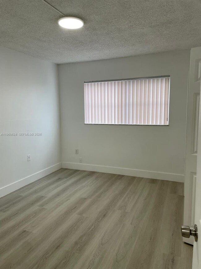 Building Photo - 1075 W 68th St