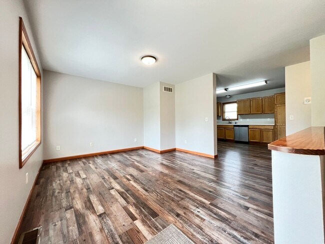 Building Photo - Spacious 3BR Duplex with Finished Basement & 2-Car Garage in Otsego