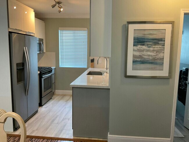 Building Photo - 7327 Dickens Ave