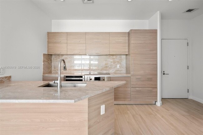 Building Photo - 1300 S Miami Ave