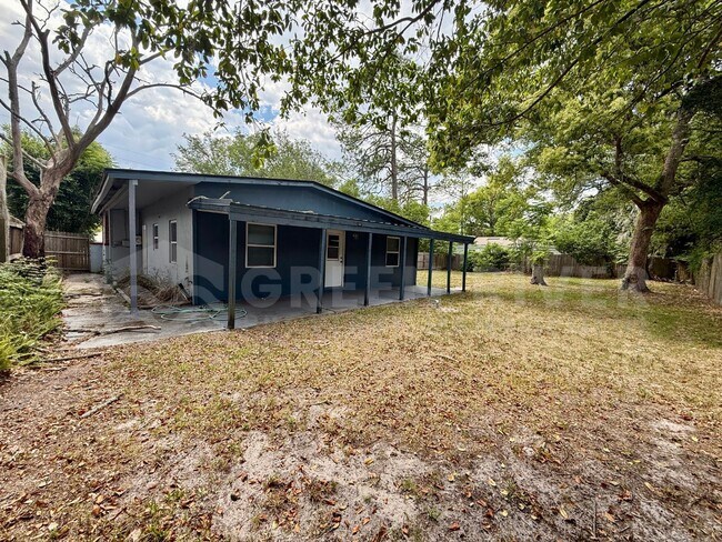 Building Photo - Fully Renovated 2BR Brick Home with Vaulted Ceilings & Backyard Retreat!