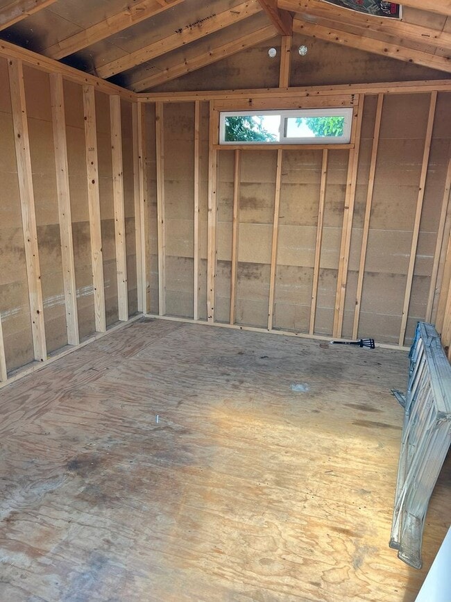 Building Photo - UPDATED BRIGHT OPEN LAYOUT LARGE BACK YARD...
