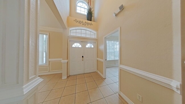 Building Photo - Spacious 6-Bedroom Pool Home with Open Floor Plan & Private Master Suite