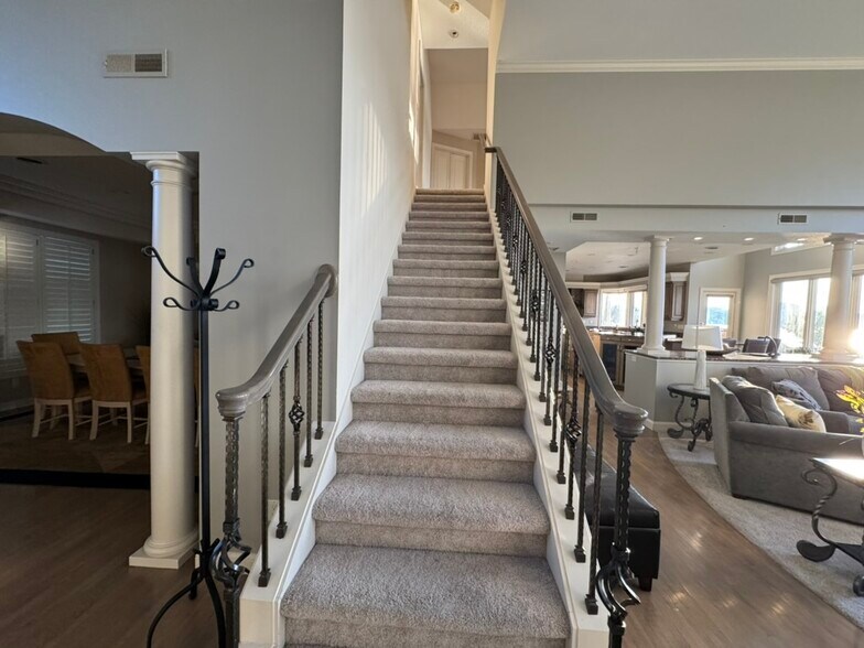Staircase to upstairs bedrooms, office, pool table - 1832 Nakomis Ave