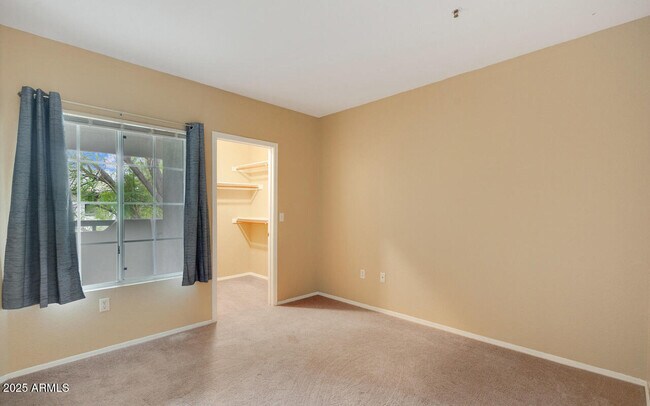 Building Photo - 9451 E Becker Ln