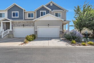 Building Photo - Modern Row End Townhome w 2 car attached g...