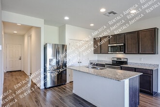 Building Photo - 25970 W Cat Balue Dr