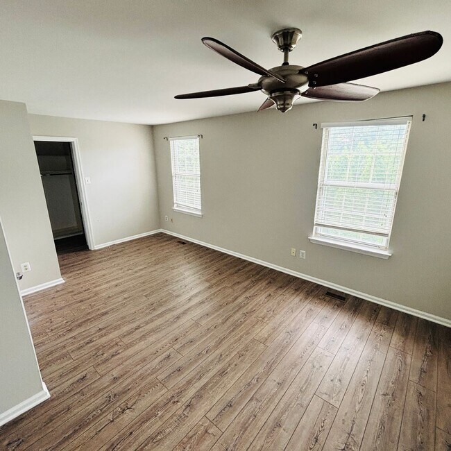 Building Photo - Spacious 3-Bedroom, 3-Bathroom Townhome with Finished Basement, Garage & Fenced Yard