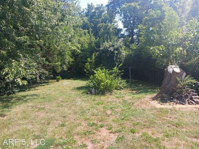 Building Photo - 2 br, 1 bath House - 743 N Kiger Road