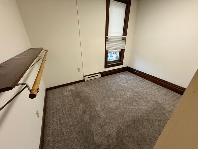 Building Photo - Spacious 4-Bedroom Apartment with Main Street Views