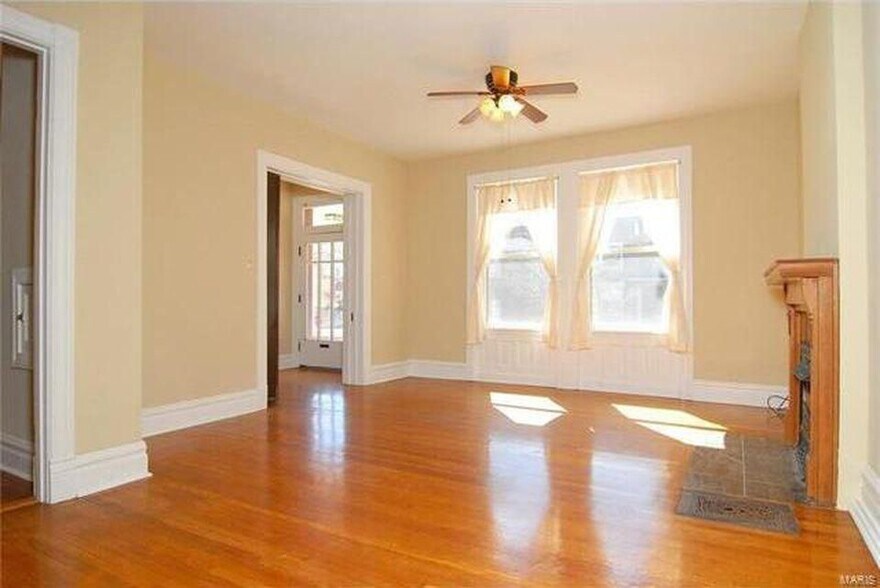 Front door, front living room window, pocket door - 2707 Ann Ave